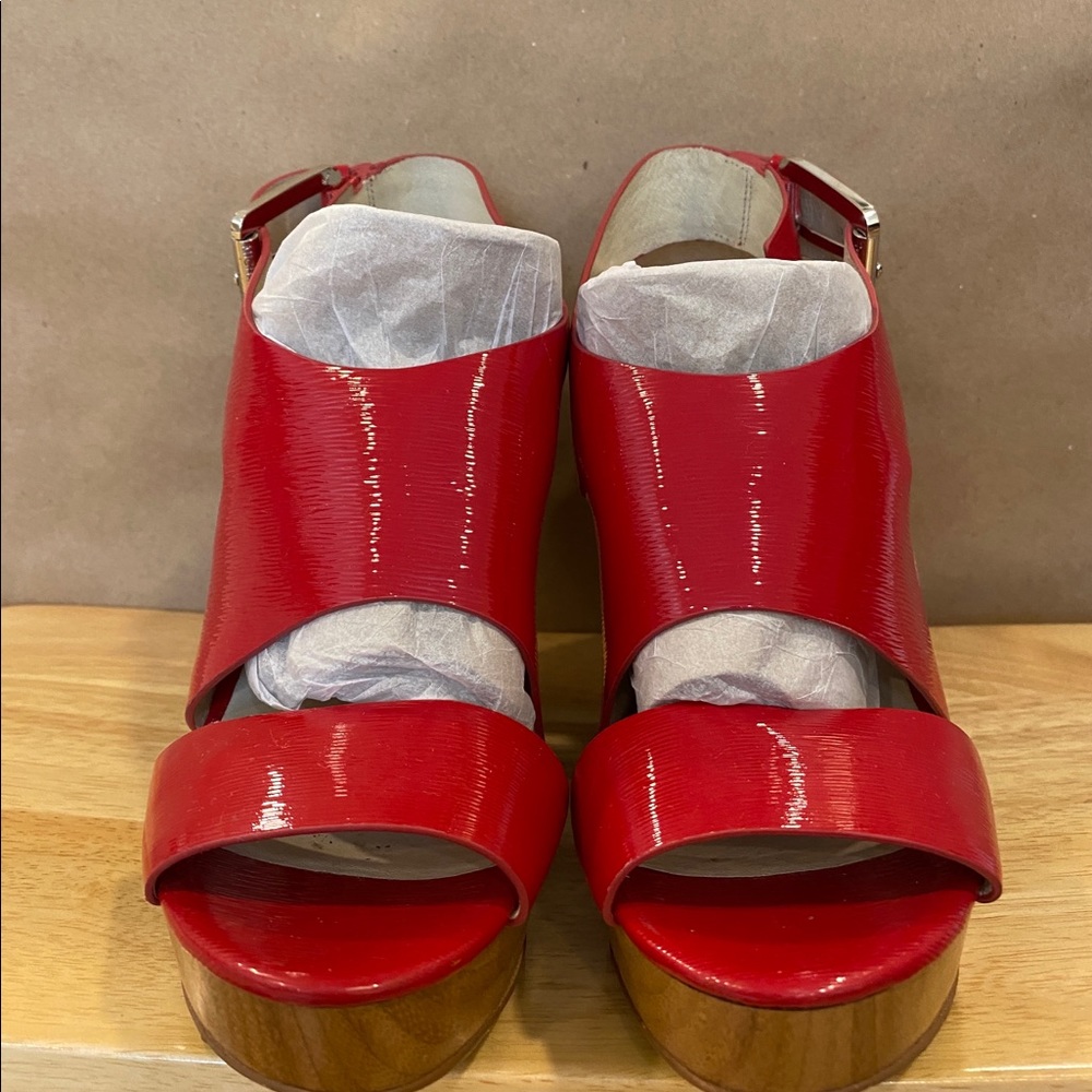Micheal Kors size 8 patent leather red wedge heel shoes
